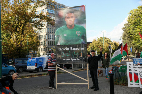 a-view-of-protestors-with-an-image-of-gavin-bazunu-ahead-of-the-game