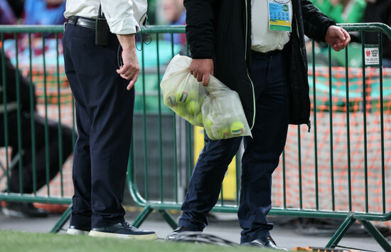 a-view-of-tennis-balls-after-being-removed-from-the-field-after-being-thrown-by-protestors