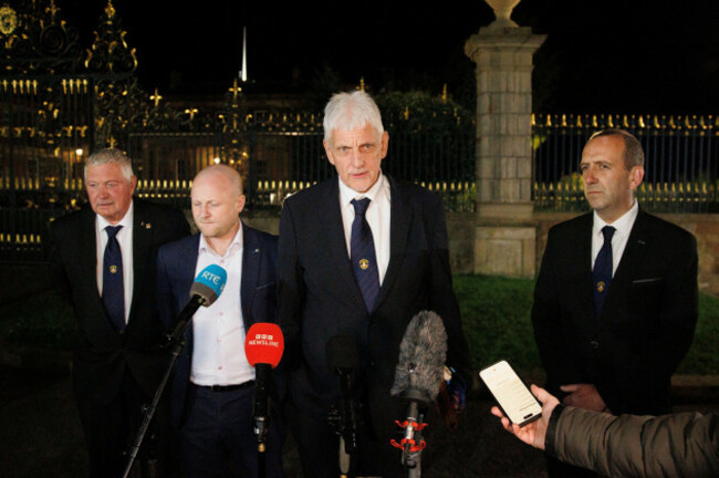 nigel-dawson-the-district-master-of-the-orange-order-in-portadown-3rd-left-and-legal-advisor-to-the-orange-order-and-spokesperson-jamie-bryson-left-speak-with-media-outside-hillsborough-castle-a