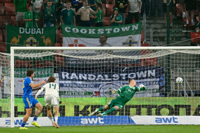 northern-irelands-isaac-price-2nd-left-scores-his-sides-second-goal-past-ukraine-goalkeeper-dmytro-riznyk-during-the-nations-league-soccer-match-between-ukraine-and-northern-ireland-in-trnava-slo