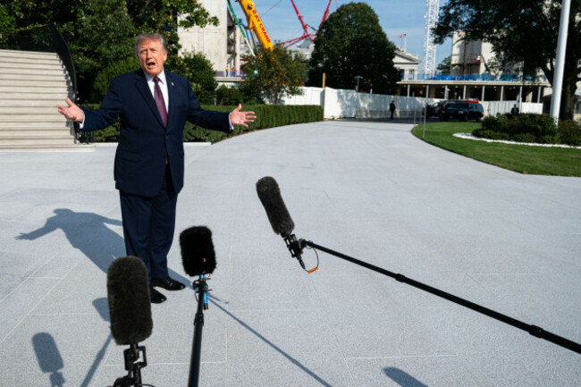 washington-united-states-of-america-02nd-oct-2026-united-states-president-donald-j-trump-speaks-to-press-as-he-departs-the-south-lawn-in-washington-dc-usa-on-friday-october-2-2026-credit-an