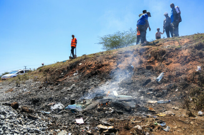 people-gather-at-the-scene-where-a-14-seater-mini-bus-was-involved-in-an-accident-killing-all-the-passengers-in-the-salama-area-makueni-county-eastern-kenya-saturday-oct-3-2026-ap-photoandre