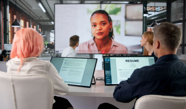 job-candidate-attentively-answering-questions-during-important-virtual-interview-call