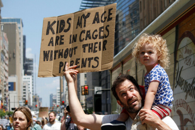 philadelphia-pa-usa-july-12-2019-a-father-and-child-hold-a-sign-to-protest-inhumane-conditions-for-children-in-immigration-detention-camps