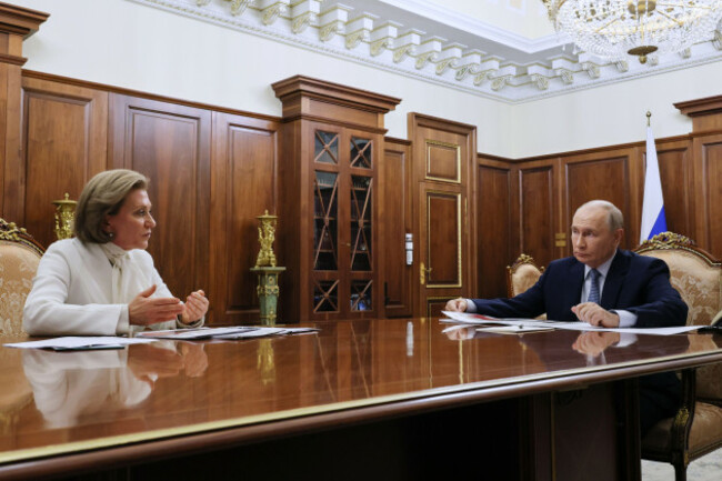 russian-president-vladimir-putin-listens-to-the-head-of-the-russian-federal-service-for-the-oversight-of-consumer-protection-and-welfare-rospotrebnadzor-anna-popova-at-the-kremlin-in-moscow-tuesday