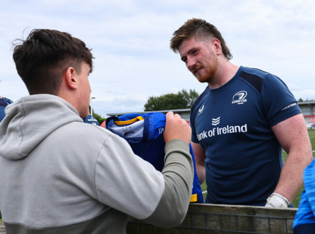 joe-mccarthy-with-fans-after-training
