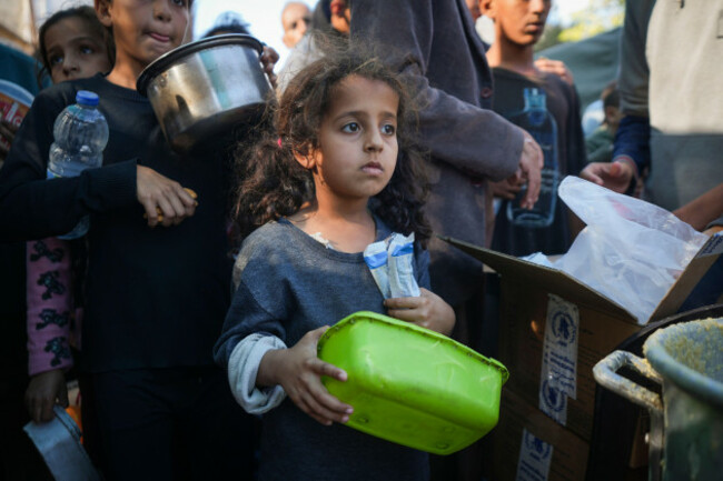 a-palestinian-little-girl-queues-for-food-in-deir-al-balah-gaza-strip-monday-nov-18-2024-ap-photoabdel-kareem-hana