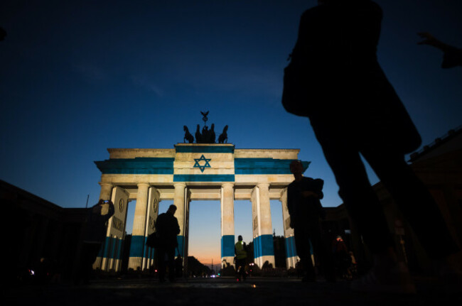 germanys-landmark-brandenburg-gate-is-illuminated-with-the-israeli-national-flag-marking-the-third-anniversary-of-the-oct-7-attack-of-hamas-on-israel-in-berlin-germany-wednesday-oct-7-2026