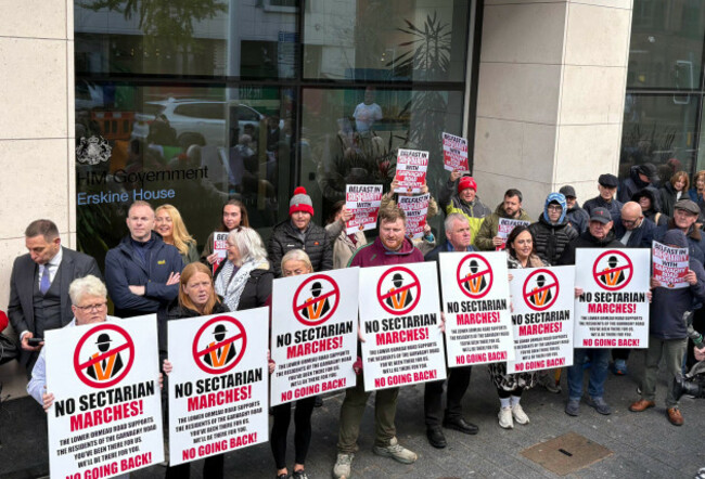 a-crowd-of-protesters-hold-a-demonstration-outside-the-northern-ireland-office-in-belfast-to-call-on-secretary-of-state-sir-chris-bryant-to-ban-orangemen-parading-down-the-predominantly-nationalist-ga