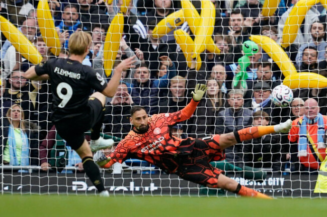 ipswich-towns-zian-flemming-scores-his-sides-second-gol-on-a-penalty-kick-during-the-english-premier-league-soccer-match-between-manchester-city-and-ipswich-town-in-manchester-england-saturday-o