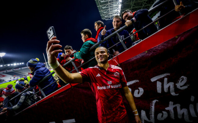 shay-mccarthy-takes-a-selfie-with-a-fan-after-the-game