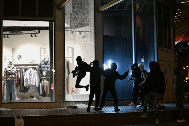 youths-break-a-store-window-during-clashes-between-protestors-and-police-in-paris-sunday-oct-18-2026-ap-photoemma-da-silva