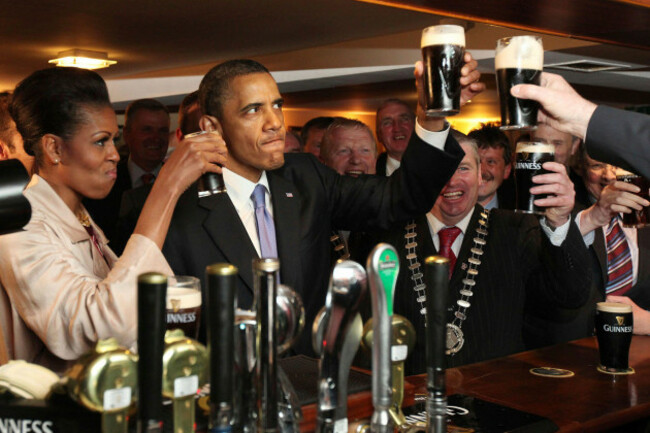 file-in-this-may-23-2011-file-photo-u-s-president-barack-obama-and-first-lady-michelle-obama-drink-guinness-beer-as-they-meet-with-local-residents-at-ollie-hayes-pub-in-moneygall-ireland-the-anc