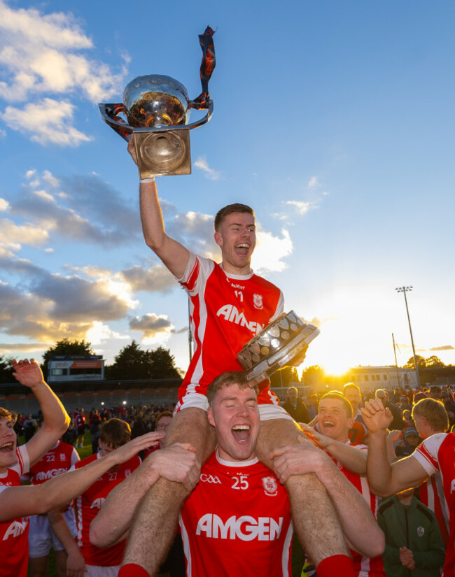 cal-doran-celebrates-after-the-game-with-the-cup
