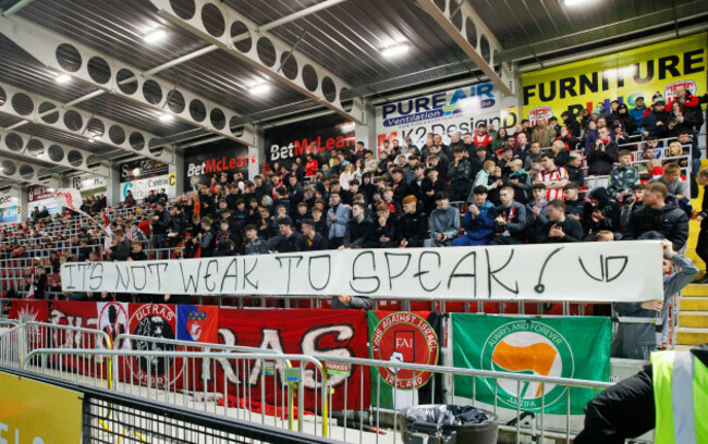 derry-city-supporters-display-a-banner-during-the-game