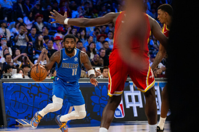 261011-macao-oct-11-2026-xinhua-kyrie-irving-l-of-dallas-mavericks-dribbles-during-the-2026-2027-nba-preseason-game-between-dallas-mavericks-and-houston-rockets-in-macao-south-china-o
