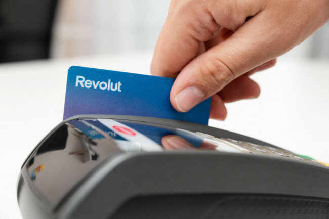 wroclaw-poland-aug-13-2022-revolut-credit-card-used-in-pos-terminal