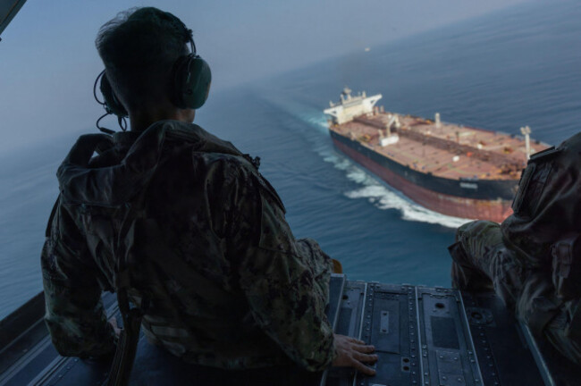 strait-of-hormuz-25-october-2026-u-s-navy-adm-brad-cooper-commander-of-u-s-central-command-observes-a-commercial-vessel-transiting-the-strait-of-hormuz-from-a-u-s-army-ch-47-chinook-helicopte