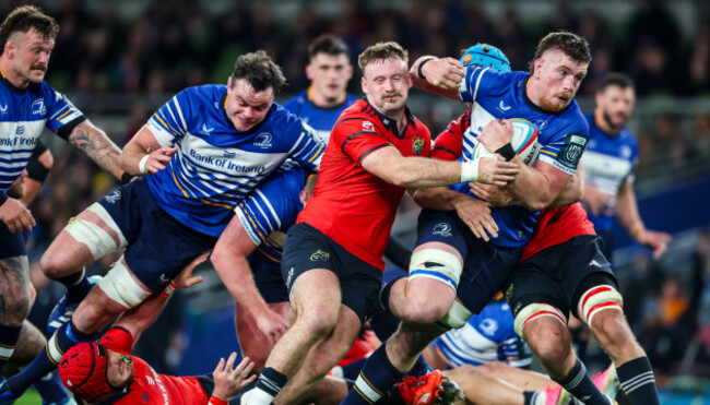 joe-mccarthy-is-tackled-by-sean-obrien-and-tadhg-beirne