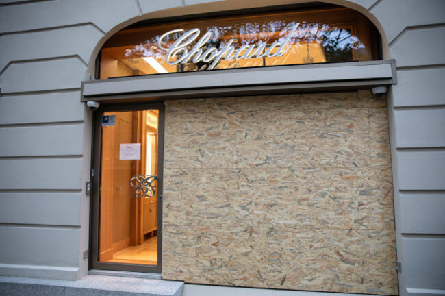 a-large-plywood-panel-covers-a-display-window-beside-the-entrance-to-the-swiss-luxury-jewelry-and-watch-retailer-chopard-on-kurfuerstendamm-in-berlin-germany-on-thursday-october-29-2026-the-bouti