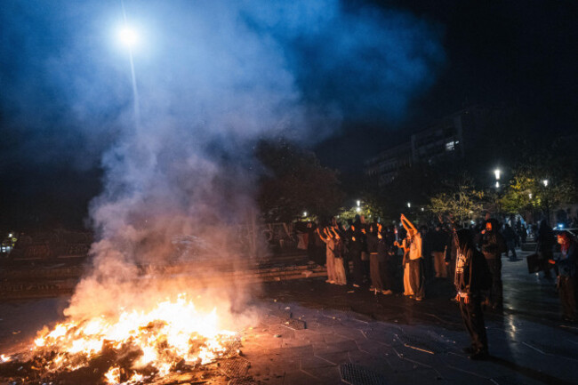 marseille-france-24th-oct-2026-demonstrators-gather-near-a-fire-during-a-protest-in-marseille-france-on-october-24-2026-authorities-deployed-around-70000-security-personnel-across-france-for-r