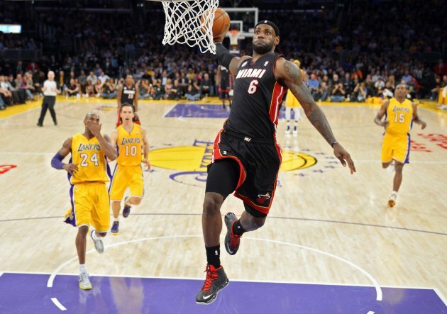 A Perfectly Timed Photo Of Lebron James Dunking On The Lakers Last Night