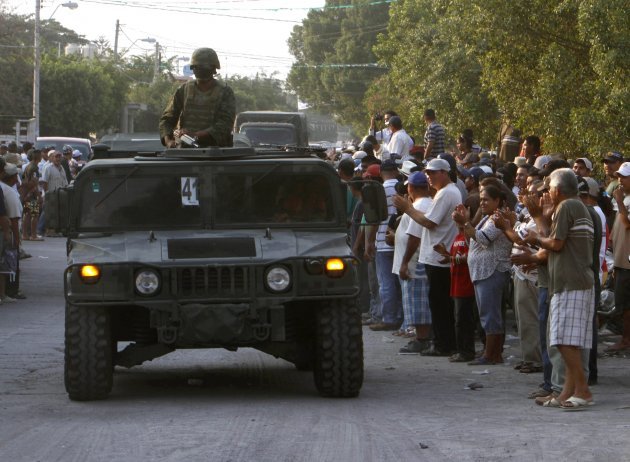 Mexican Troops Occupy Towns Amid War Between Vigilantes And Drug Cartels